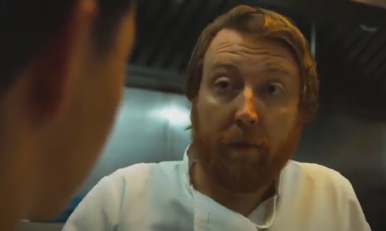 A chef in conversation in Authentic